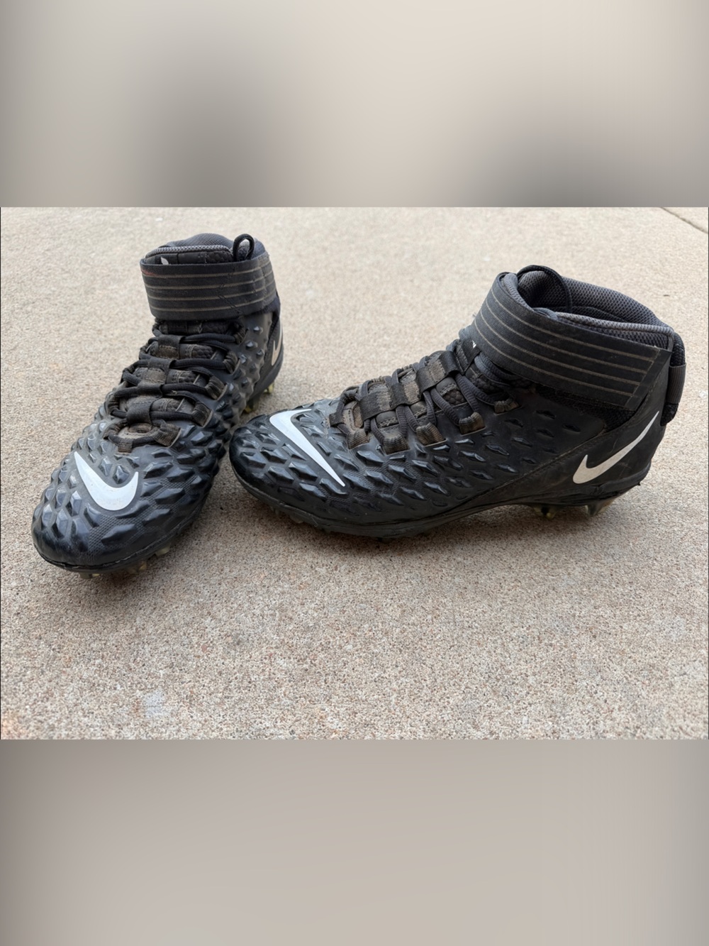 Nike Men's Black High-Top Football Cleats with White Swoosh